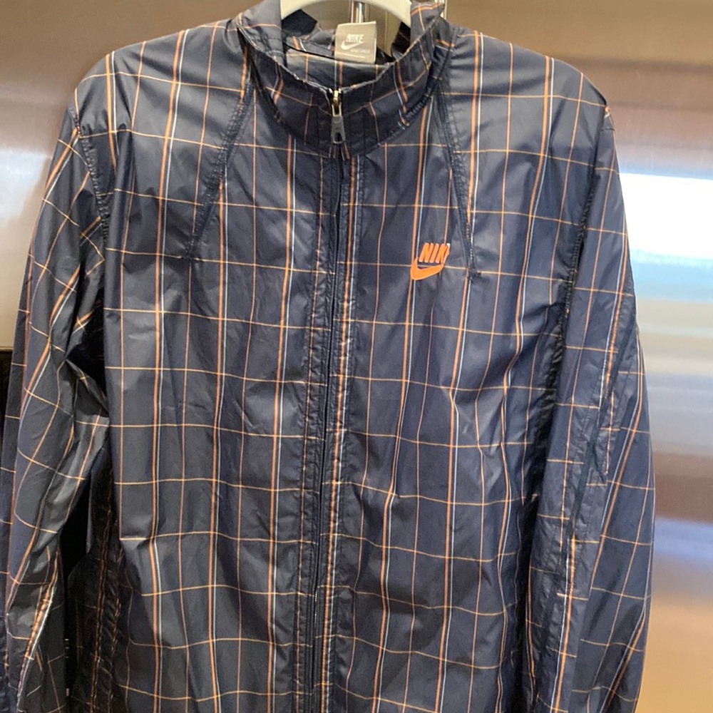 Nike windbreaker.  Navy blue.  Large.  Light jacket. Excellent condition